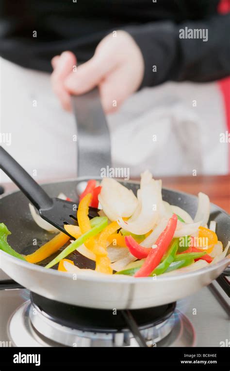 Sauteing vegetables hi-res stock photography and images - Alamy