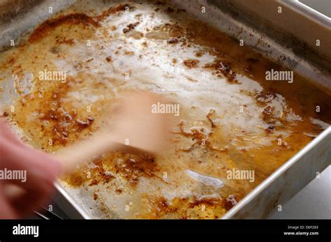 Deglazing a Pan Stock Photo - Alamy