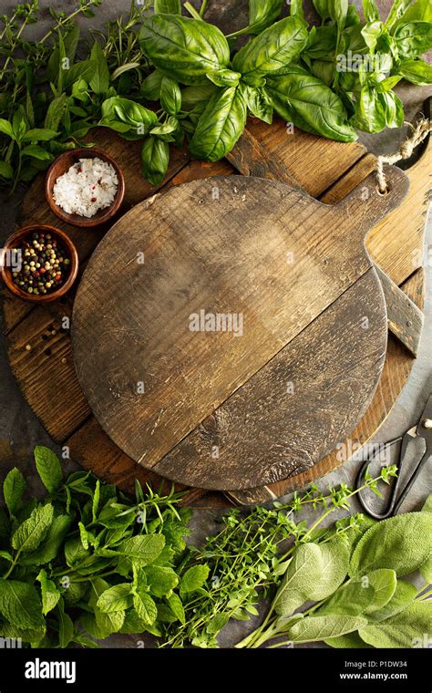 Cooking with fresh herbs Stock Photo - Alamy
